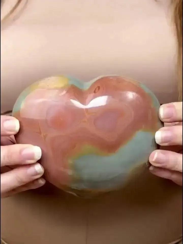 Polychrome Jasper Heart: Hand-carved crystal heart with swirling earthy reds, oranges, browns, and creams.