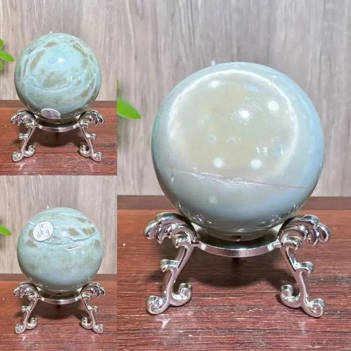 Polychrome Jasper Crystal Sphere: Smooth, polished sphere with earthy reds, browns, tans, and grays for grounding energy.