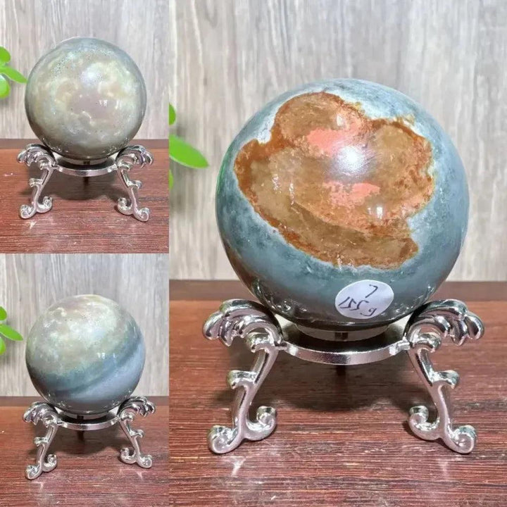 Polychrome Jasper Crystal Sphere: Vibrant earthy reds, browns, tans, and grays swirl on a polished sphere for grounding energy.