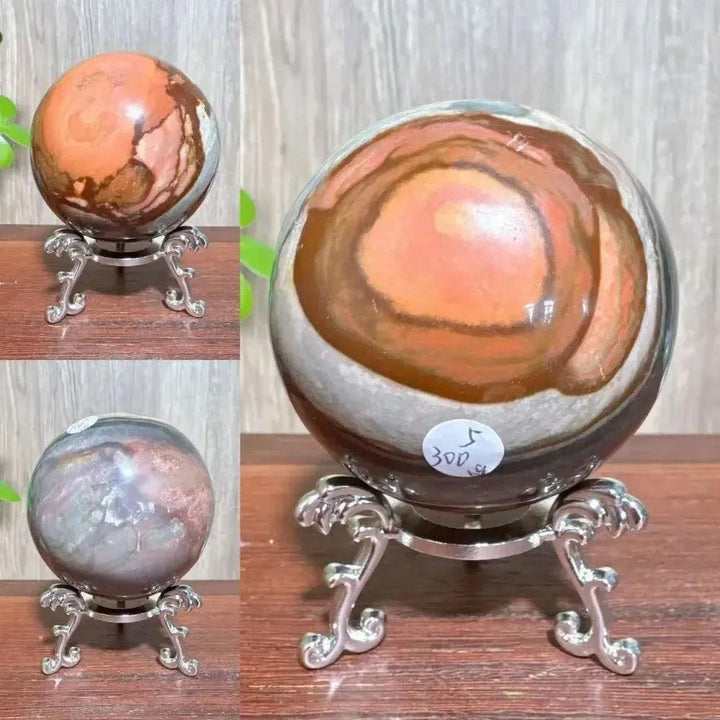 Polychrome Jasper Crystal Sphere: Vibrant earthy reds, browns, tans, and grays swirl on a polished sphere on a silver stand.