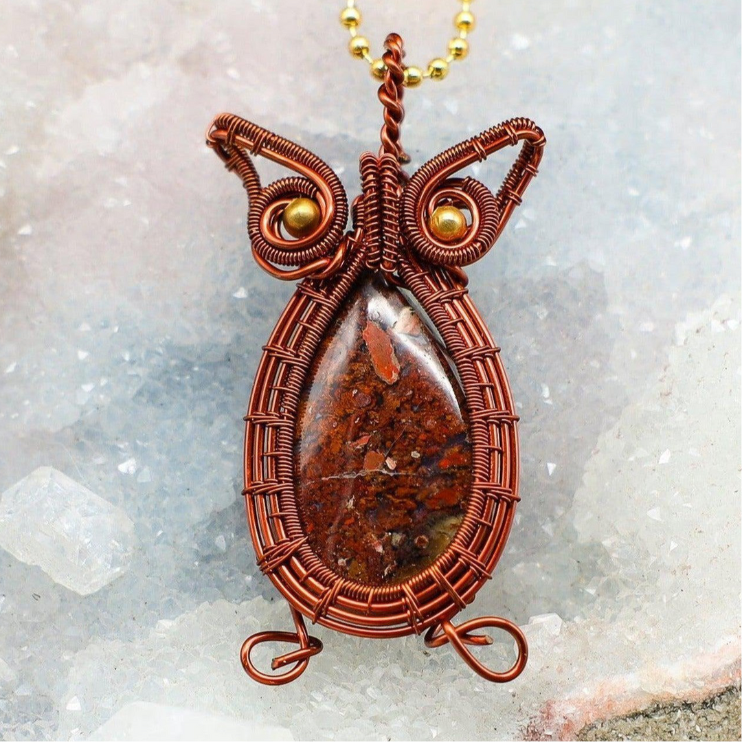Captivating Poppy Jasper Owl Wire Wrap Pendant: handcrafted copper owl with vibrant red, orange, and brown jasper.