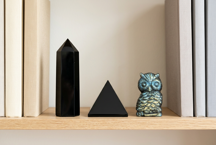 Protection crystal set: Black Tourmaline, Obsidian and Labradorite on a bookshelf