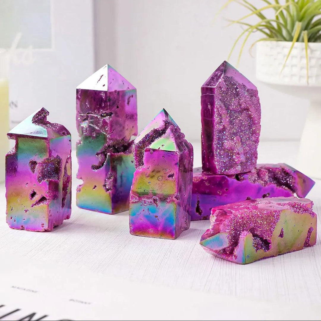 Electroplated purple sphalerite druzy tower geode points with iridescent finish for healing, meditation, and home decor.