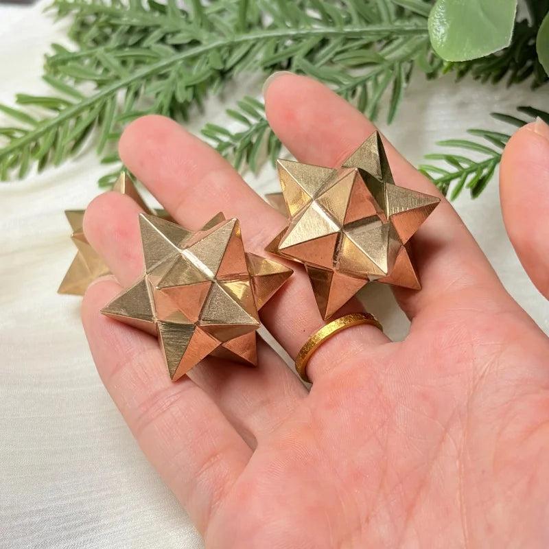 Golden Pyrite Crystal Carved Merkaba Stars for manifestation and solar plexus chakra healing.
