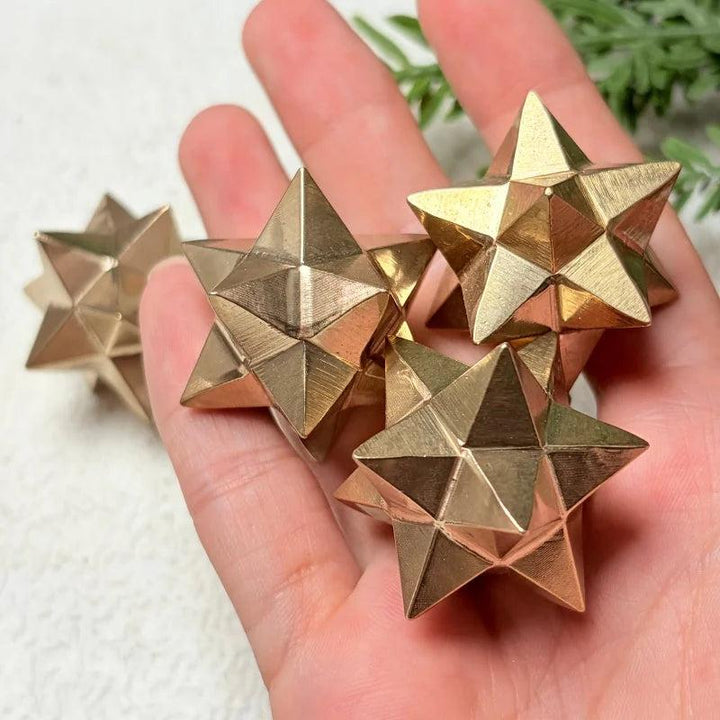 Golden Pyrite Crystal Carved Merkaba Stars for manifestation and solar plexus chakra healing.