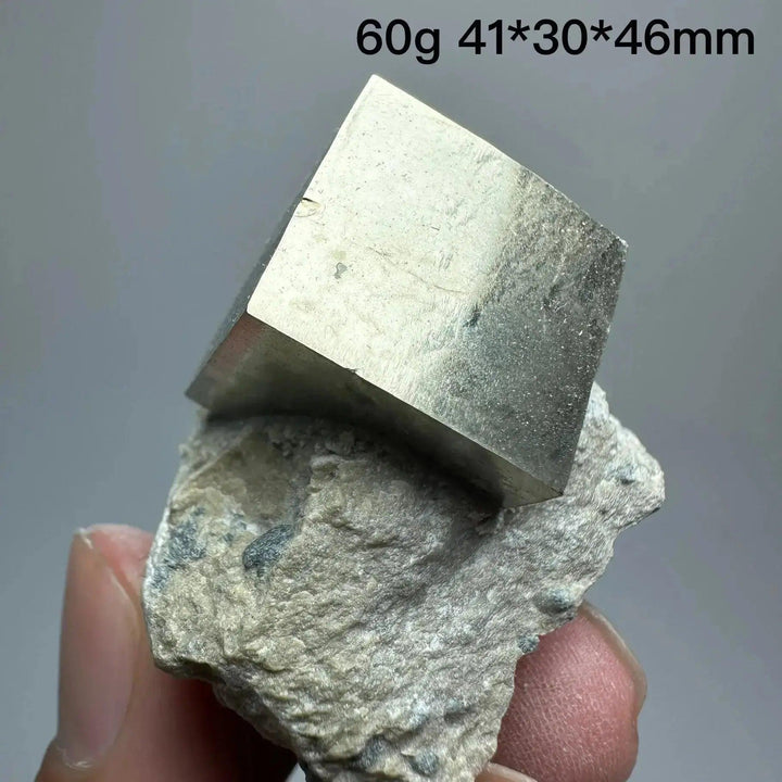 Metallic gold Pyrite Cube Crystal Specimen on matrix, showcasing natural geometric perfection from Crystal Destiny.