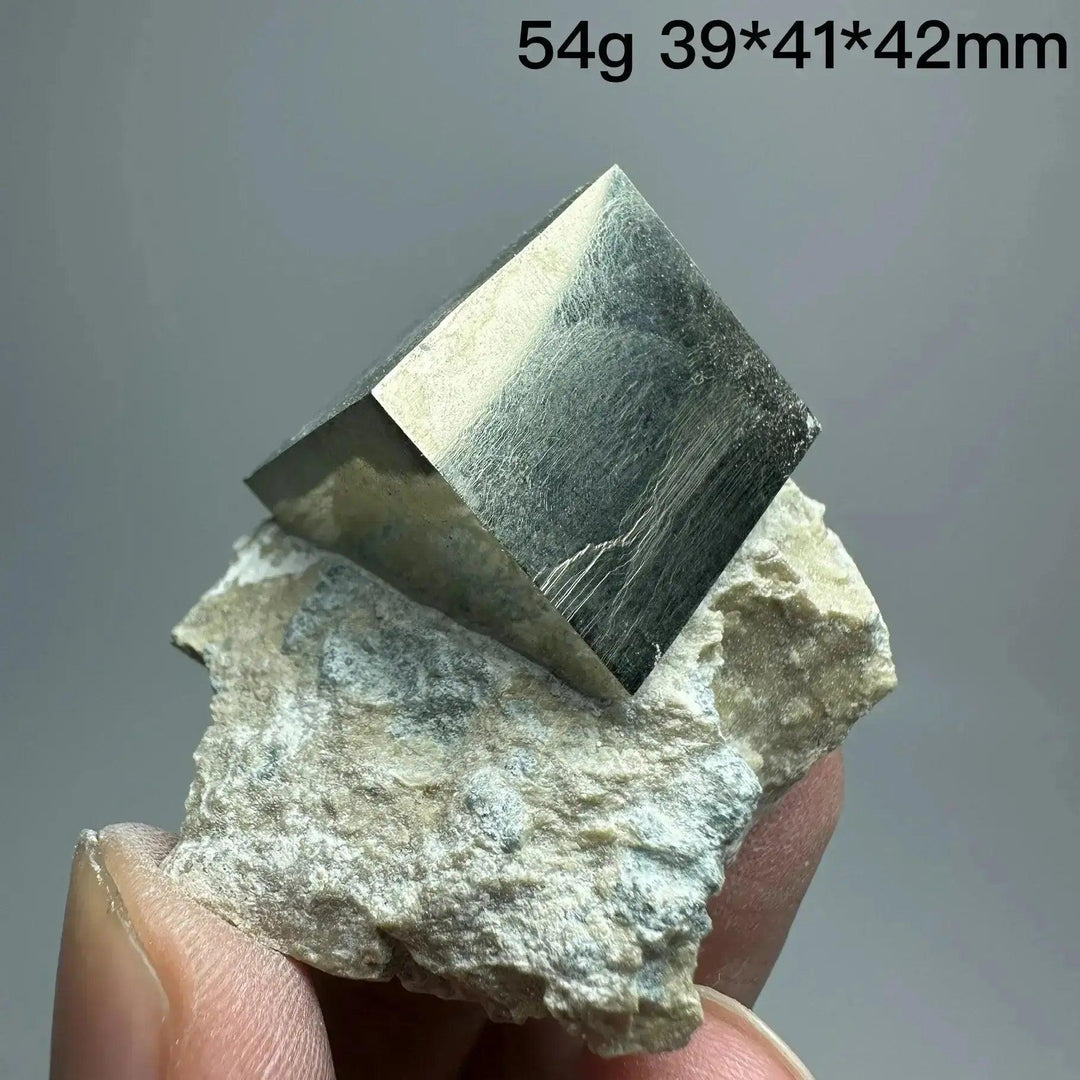 Crystal Destiny's Pyrite Cube Crystal Specimen, a metallic gold, naturally formed cubic crystal on matrix.