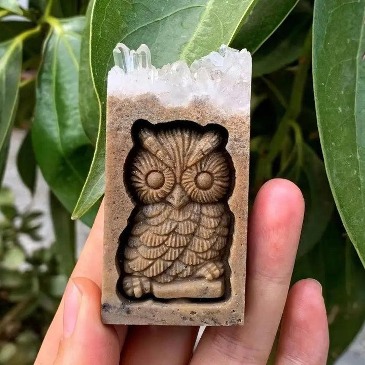Hand-carved Quartz Crystal Owl for protection, featuring detailed owl artistry atop a natural, raw crystal cluster.