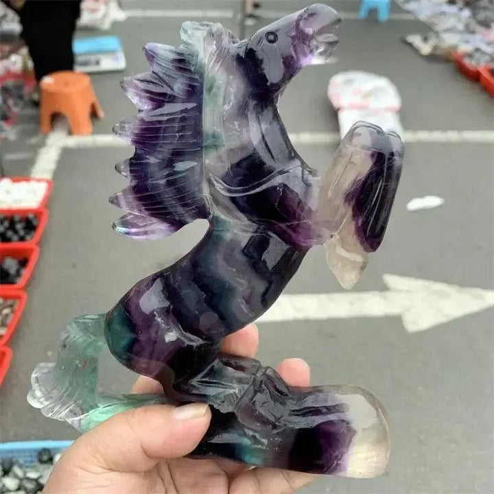 Vibrant Rainbow Fluorite Horse Carving, showcasing purple, green, blue, and clear tones for mental clarity and focus.