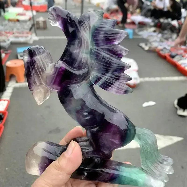 Vibrant Rainbow Fluorite Horse Carving, showcasing purple, green, blue, and clear tones for clarity and focus.