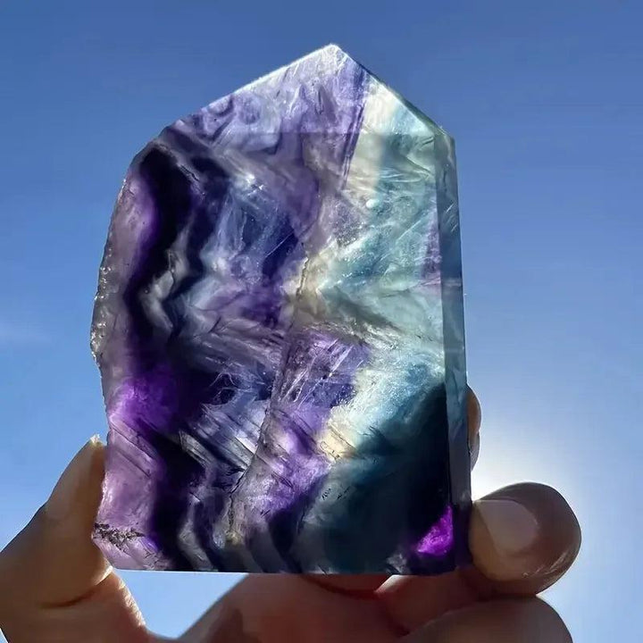 Rainbow Fluorite Raw Edge Tower with mesmerizing purple, green, blue bands for clarity and focus.