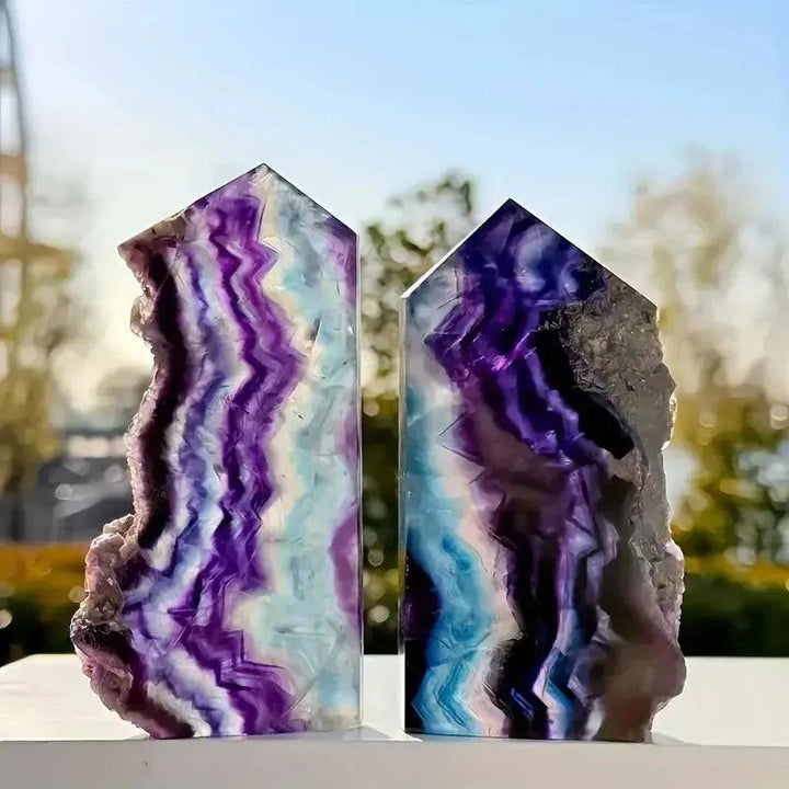 Rainbow Fluorite Raw Edge Towers with mesmerizing purple, green, blue bands for mental clarity and focus.