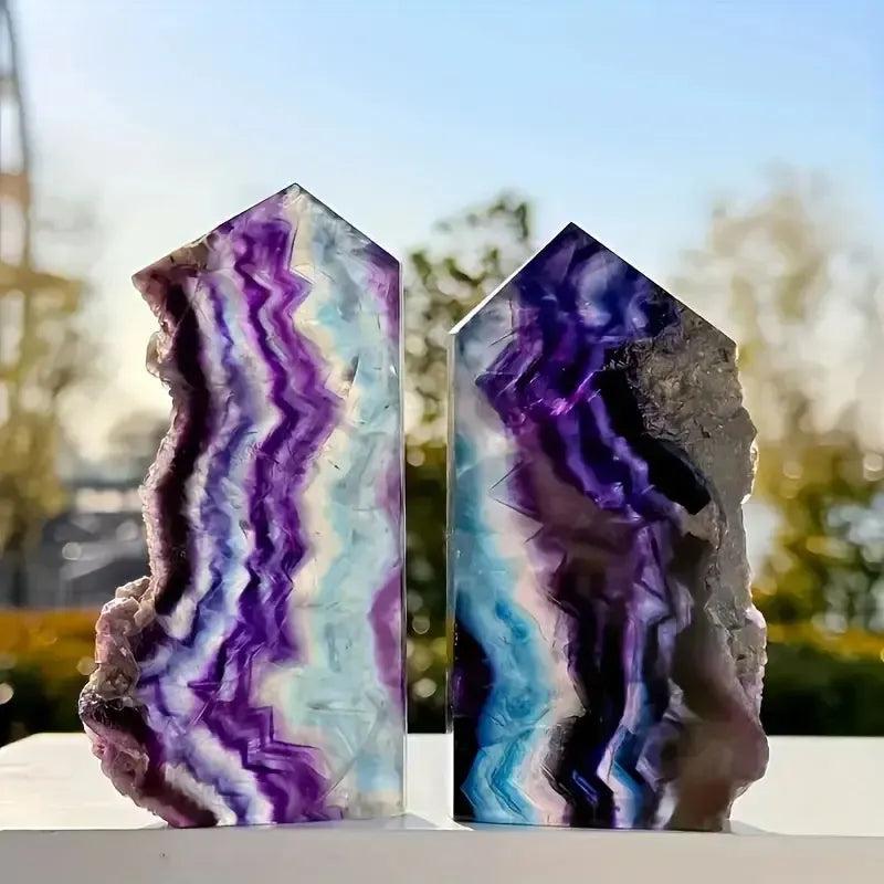 Two Rainbow Fluorite Raw Edge Towers from Crystal Destiny, showcasing purple, green, and blue bands.