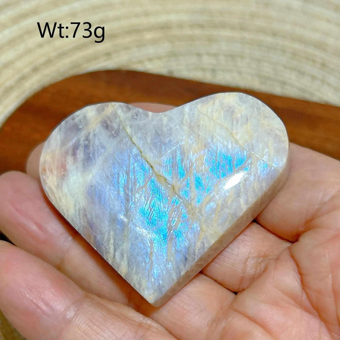 Polished Rainbow Moonstone and Sunstone heart with blue flash, 73g, balancing Sacral and Solar Plexus chakra energy.