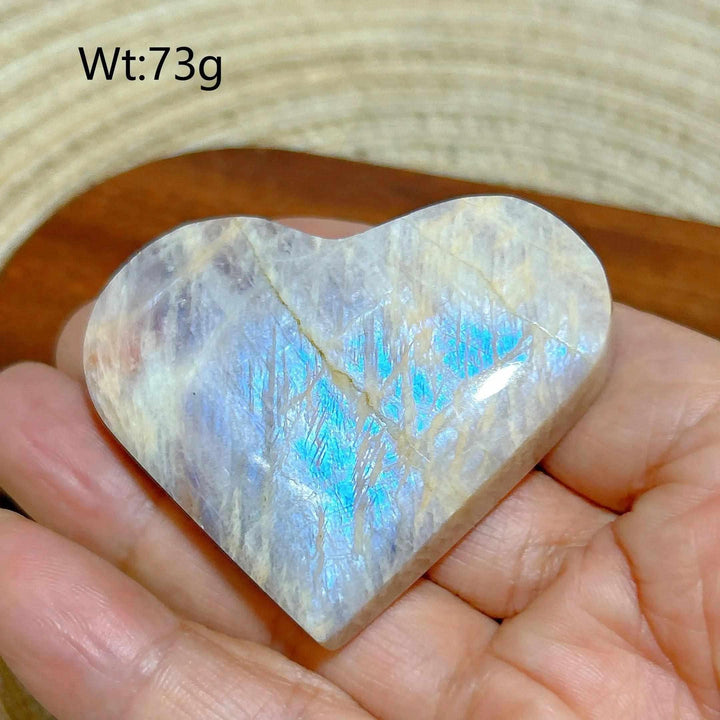 Polished Rainbow Moonstone and Sunstone heart with blue flash, 73g, balancing Sacral and Solar Plexus chakra energy.