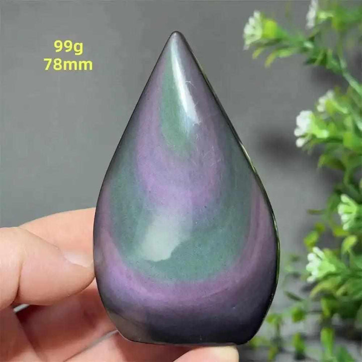 Polished Rainbow Obsidian torch freeform with vibrant purple and green sheen, perfect for grounding and protection.