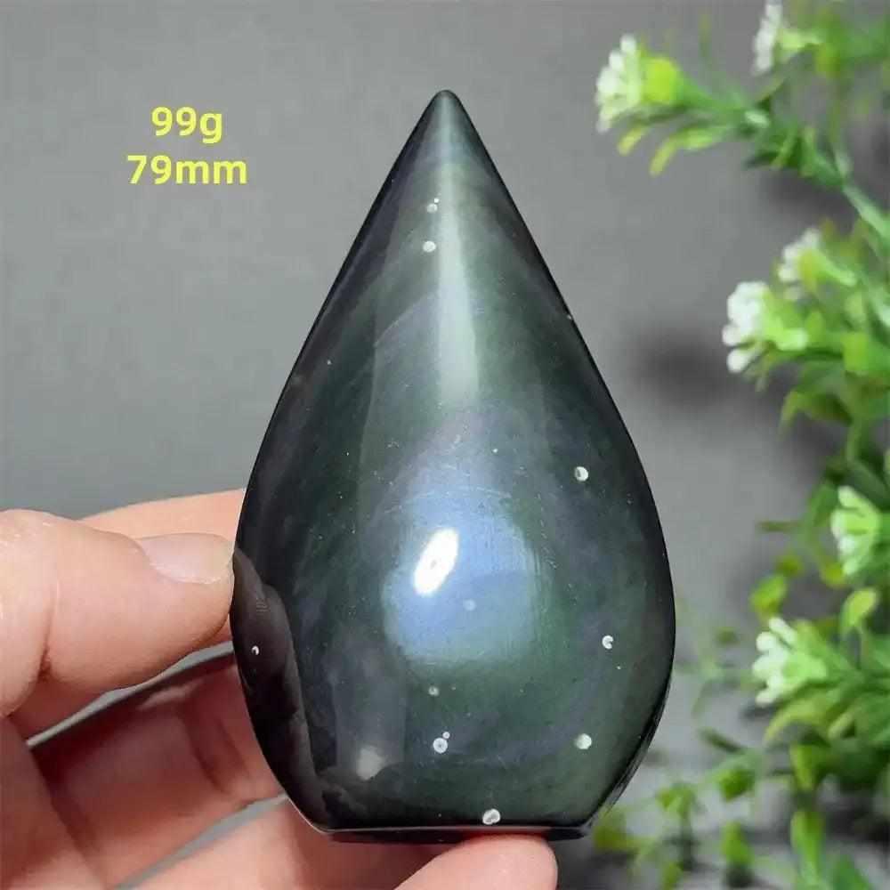 Polished 79mm Rainbow Obsidian torch freeform with a grounding black volcanic glass finish and subtle iridescent sheen.