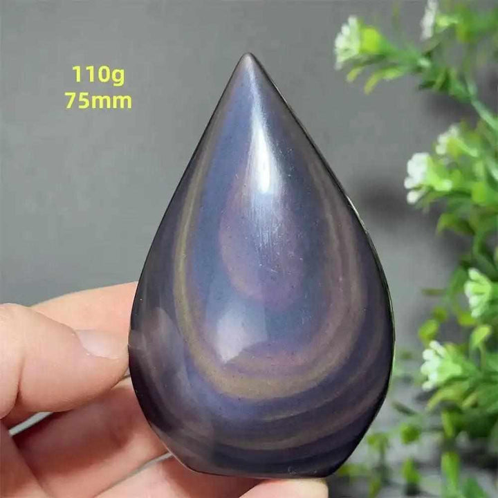 Polished Rainbow Obsidian torch freeform with purple, green, and gold bands for grounding and protection.