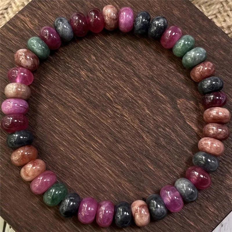Rainbow Tourmaline beaded bracelet featuring genuine colorful gemstone beads for balancing, protective energy.