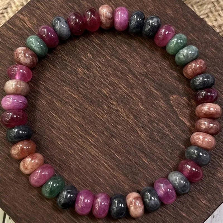 Rainbow Tourmaline beaded bracelet featuring genuine colorful gemstone beads for balancing, protective energy.
