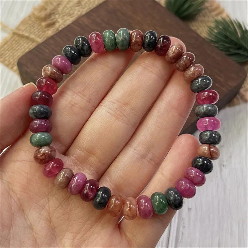 Handmade Rainbow Tourmaline beaded bracelet featuring genuine colorful gemstone beads for balancing and protection.