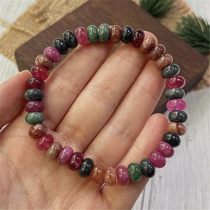 Handmade Rainbow Tourmaline beaded bracelet featuring genuine colorful gemstone beads for balancing and protection.