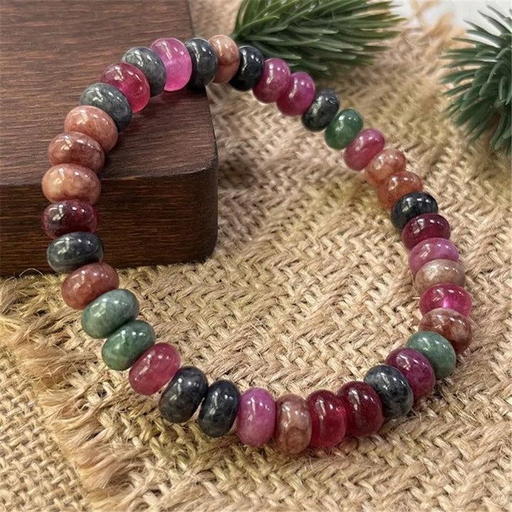 Rainbow Tourmaline beaded bracelet featuring vibrant, hand-strung gemstone beads for balancing and uplifting energy.