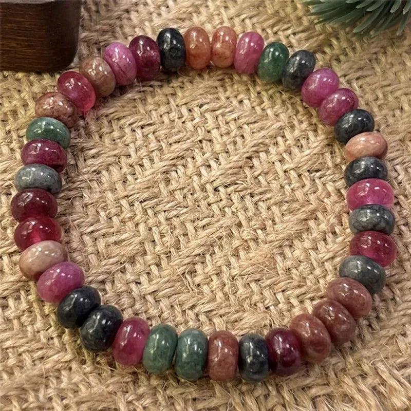 Handmade Rainbow Tourmaline beaded bracelet featuring genuine colorful gemstone beads for balancing and uplifting energy.