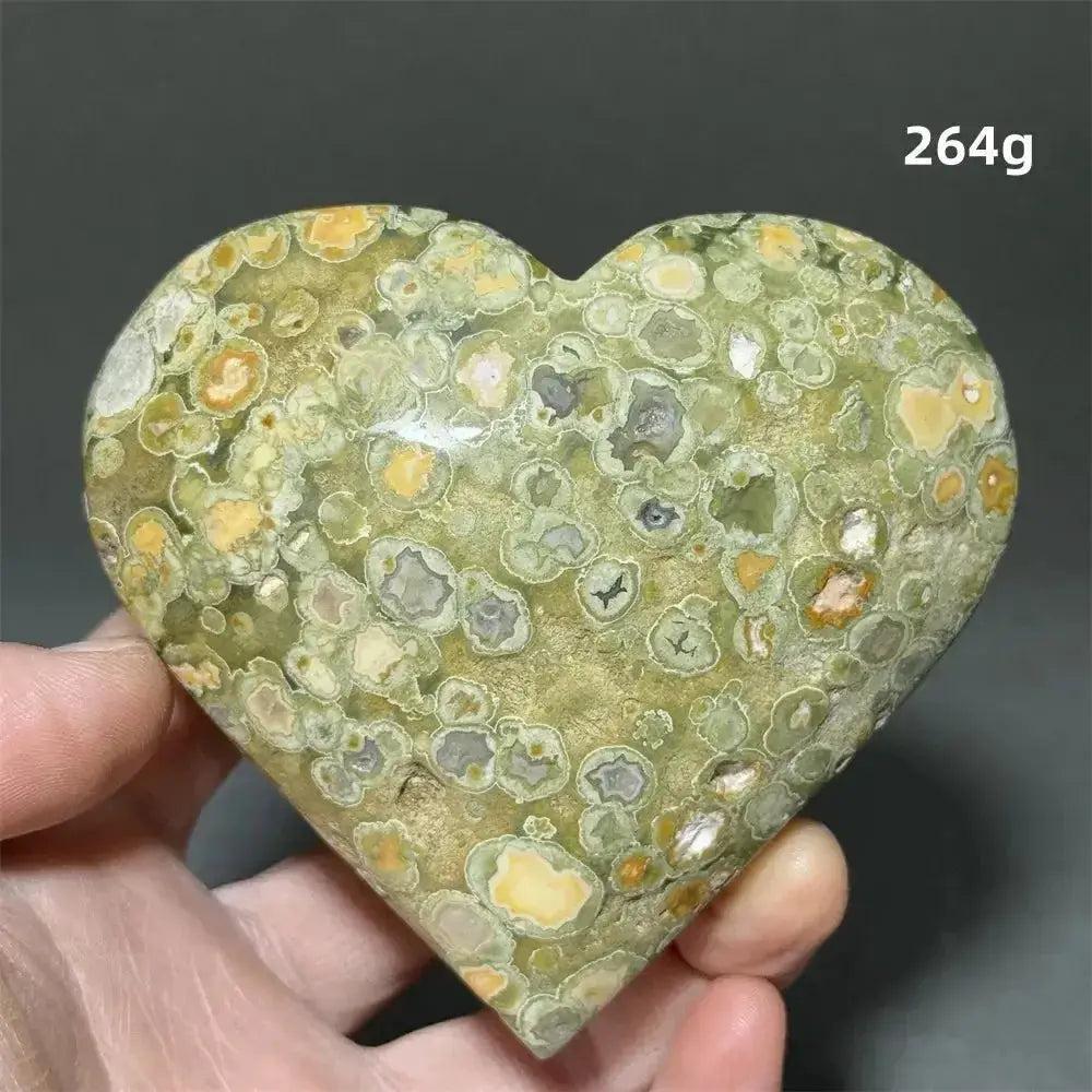 Rainforest Jasper Heart Healing Crystal: Green, yellow, and grey patterned heart-shaped Rhyolite for emotional grounding.