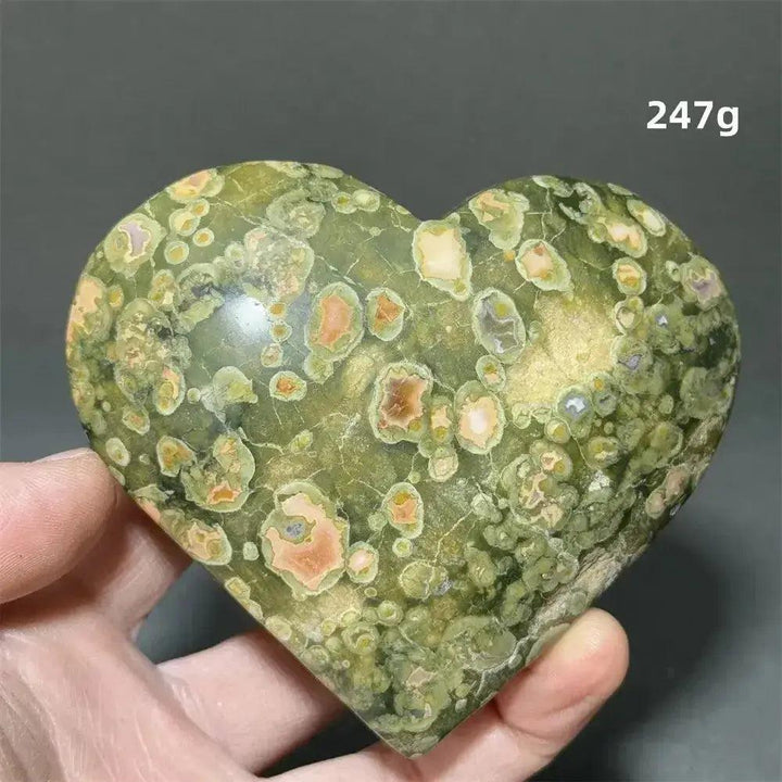 Rainforest Jasper Heart Healing Crystal, 247g, with organic green and pink patterns, held in a hand.
