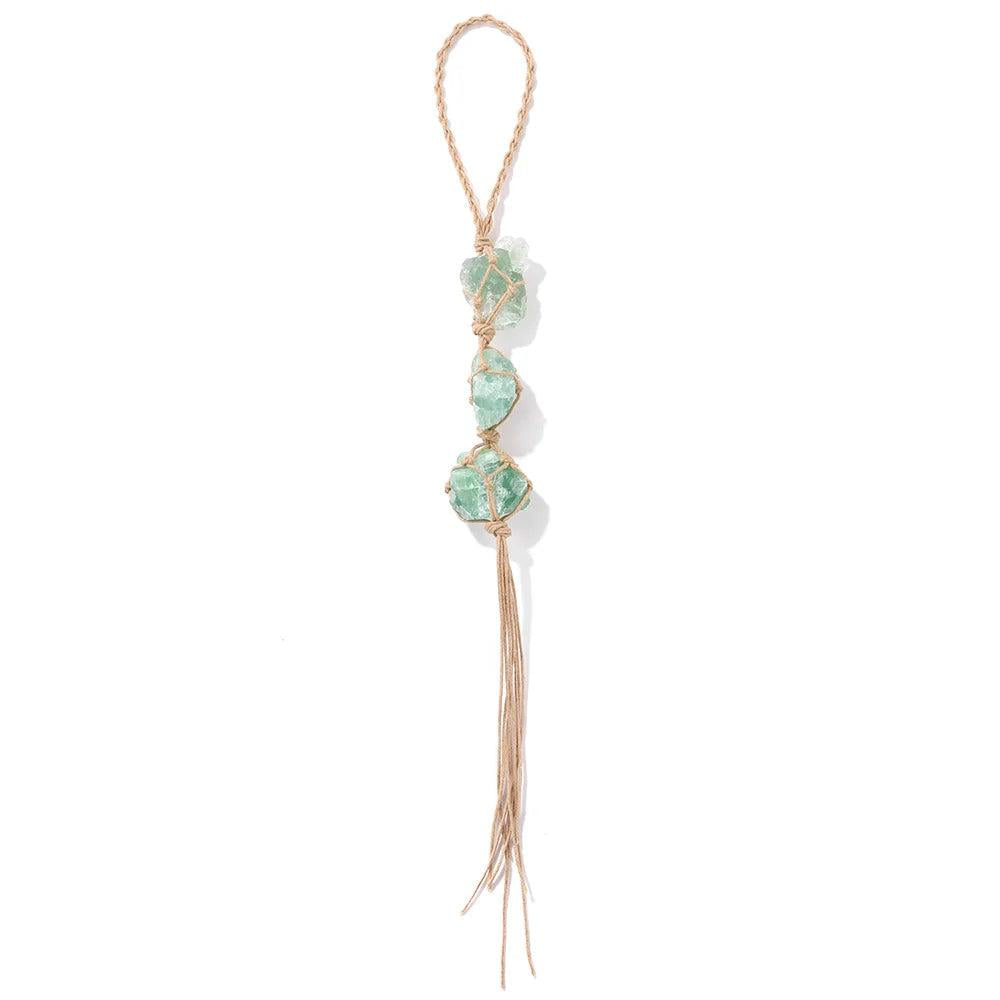 Green raw quartz crystal car pendant with three irregular stones in macrame netting on a natural twine hanger.
