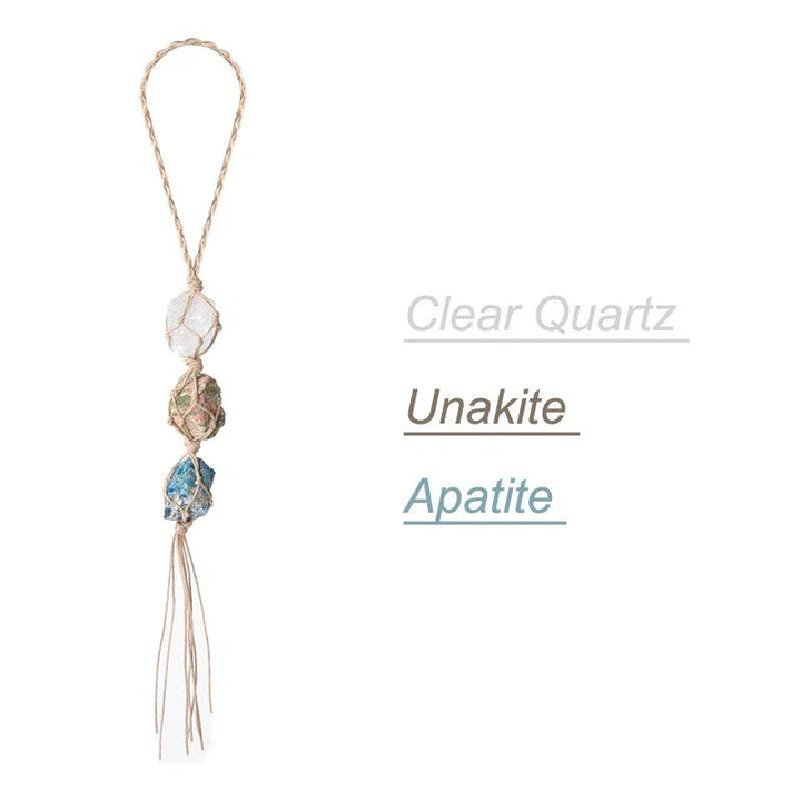 Natural stone car pendant with clear quartz, unakite, and apatite crystals on a braided cord.
