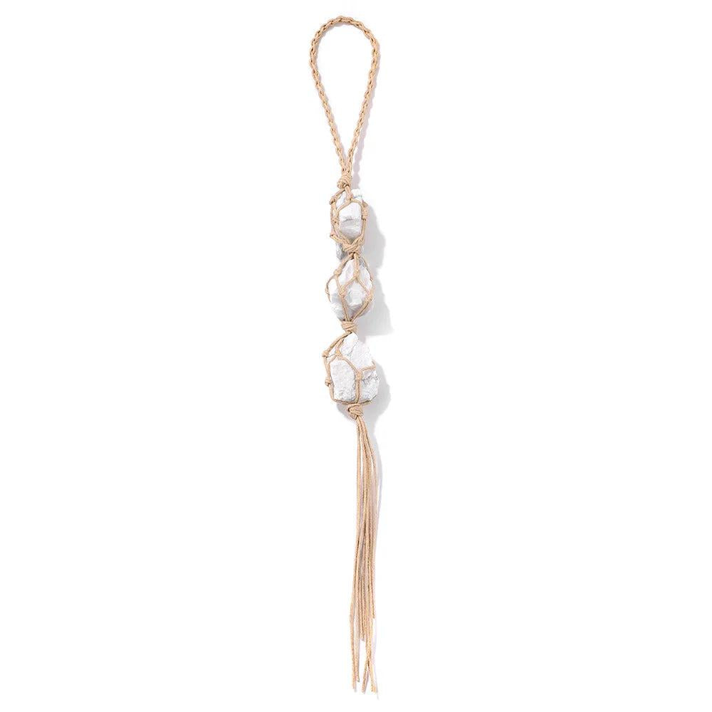 Natural raw quartz crystal car pendant with three white irregular stones in macrame, promoting healing and positive energy.