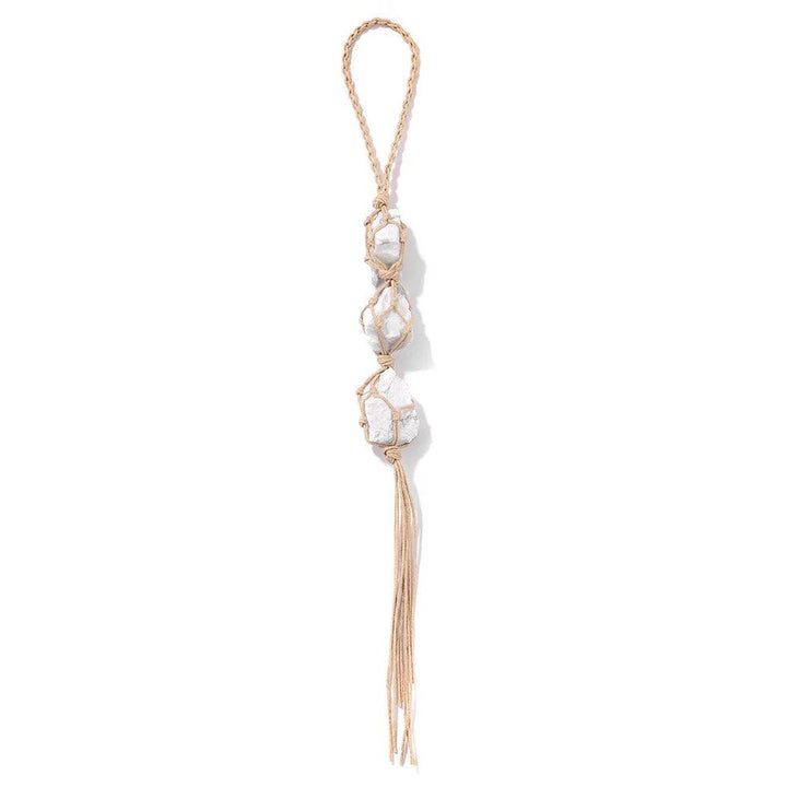 Natural raw quartz crystal car pendant with three white irregular stones in macrame, promoting healing and positive energy.