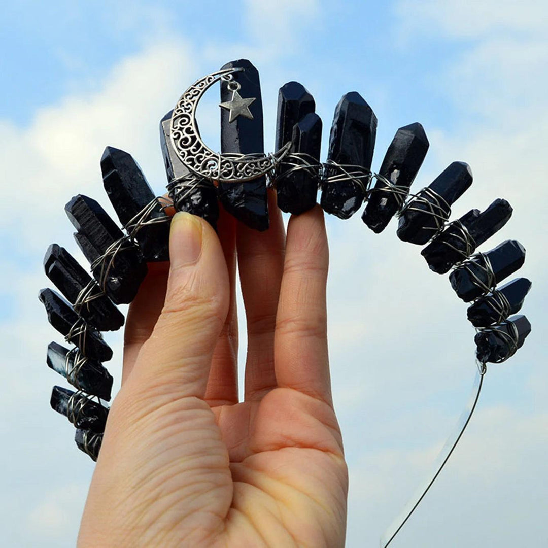 Black raw quartz crystal tiara with a silver crescent moon and star, wired onto a headband.