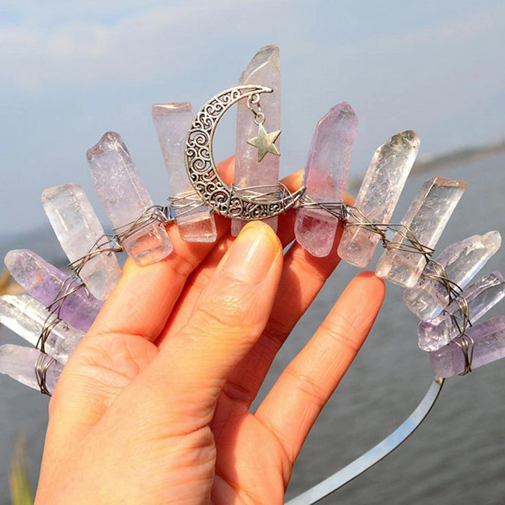 Raw clear and amethyst quartz crystal tiara with silver crescent moon and star, promoting healing energy.