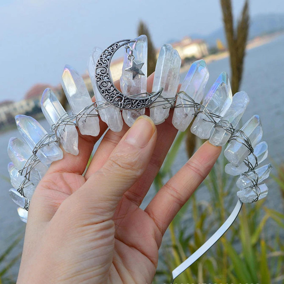 Raw quartz crystal tiara with a silver crescent moon and star charm, wire-wrapped on a white headband.