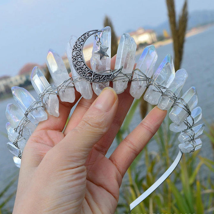 Raw quartz crystal tiara with a silver crescent moon and star charm, wire-wrapped on a white headband.