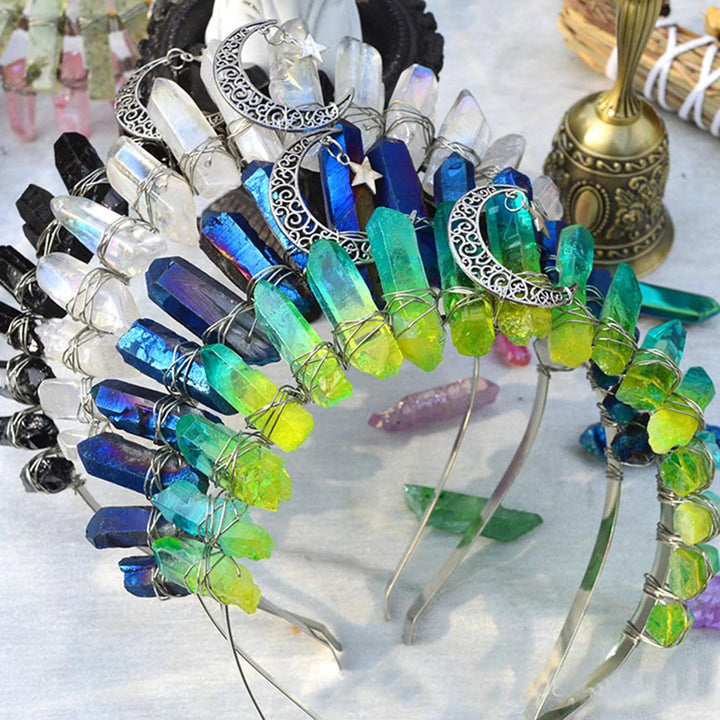 Raw quartz crystal tiara with clear, blue, green, and black points, silver crescent moons, and stars.