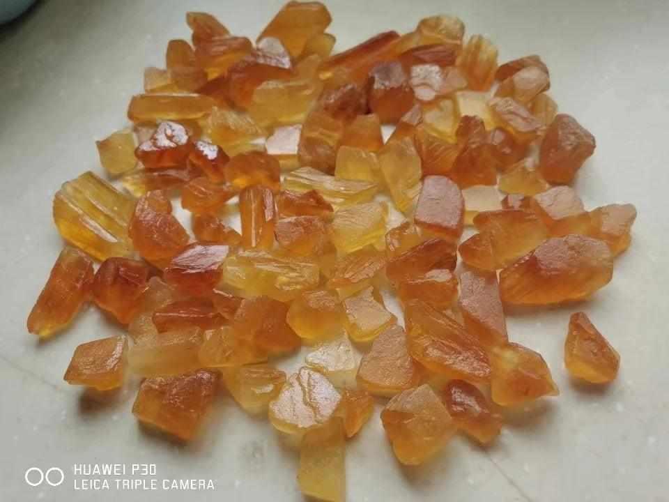 Raw honey calcite pieces with warm golden amber tones, perfect for solar plexus chakra healing and crystal grids.