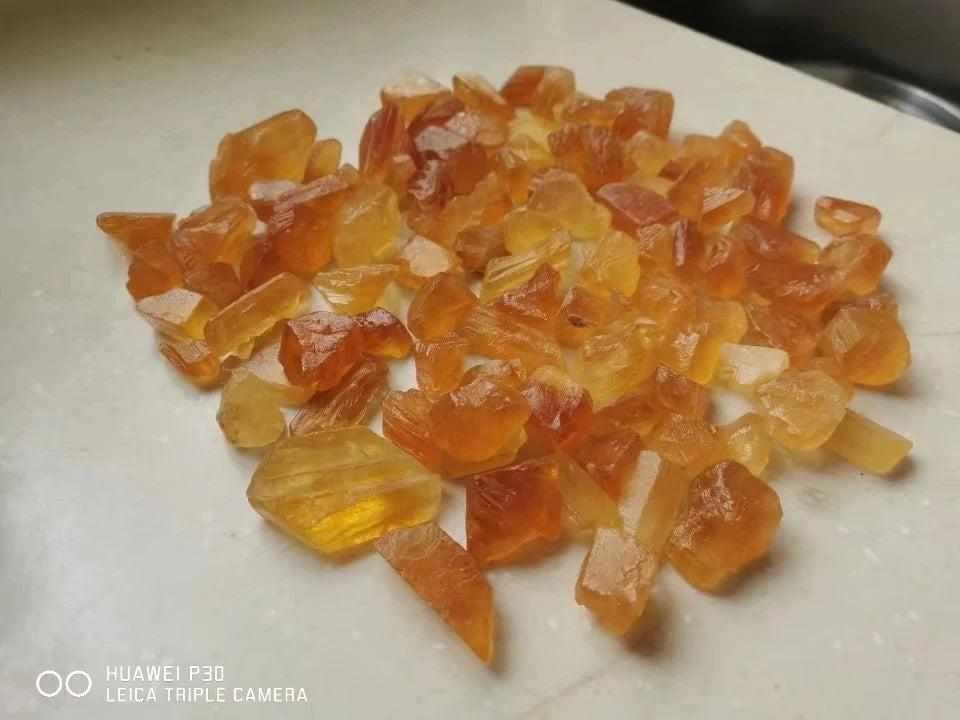 Raw honey calcite crystals with warm golden amber tones and natural, unpolished rough faces for energy and confidence.