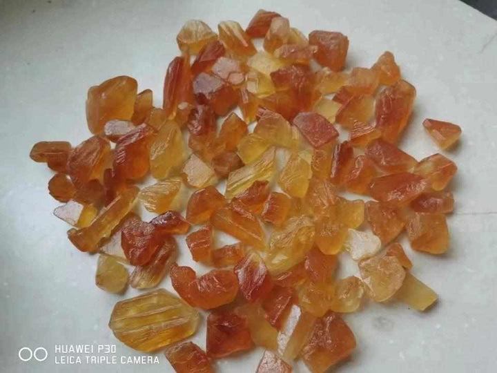 Raw honey calcite crystals in warm golden amber hues, perfect for solar plexus chakra energy and crystal grids.