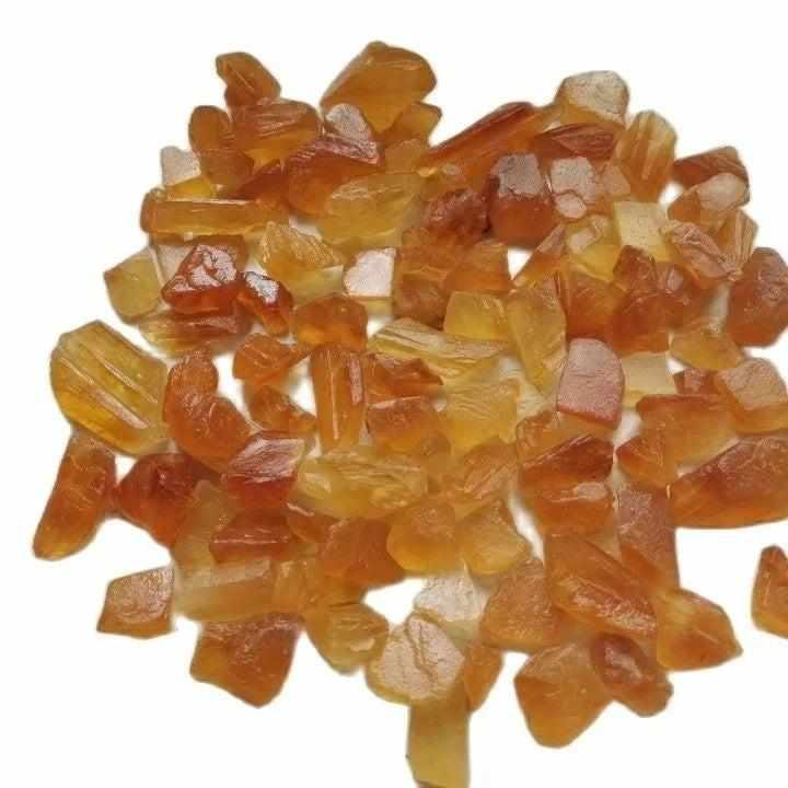 Raw honey calcite crystals with warm golden amber tones, perfect for solar plexus chakra energy and natural decor.
