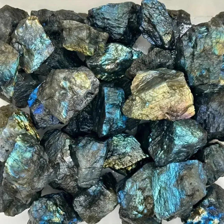 Raw Labradorite rough crystals from Crystal Destiny, showing iridescent blue, green, and gold flashes.