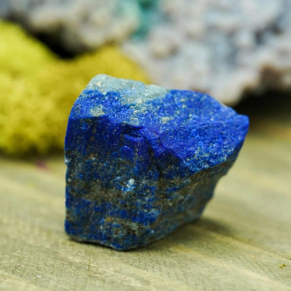 Raw Lapis Lazuli crystal with deep royal blue color and golden pyrite flecks for Throat and Third Eye Chakra healing.
