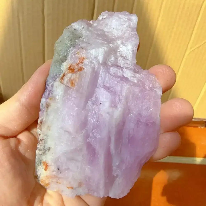 Raw pink Kunzite crystal with a glassy, lilac-hued rough texture, perfect for Heart chakra healing and emotional calm.