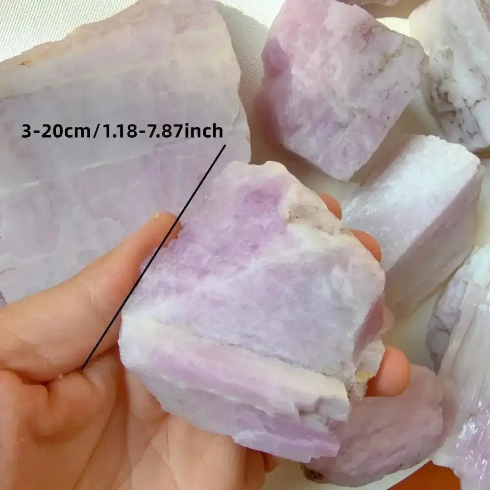 Raw pink kunzite rough stone with glassy lilac luster, perfect for heart chakra healing and emotional calm.