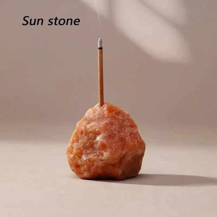 Raw Sunstone incense holder with a rough, irregular texture and a 3mm opening for a grounding, radiant ritual space.