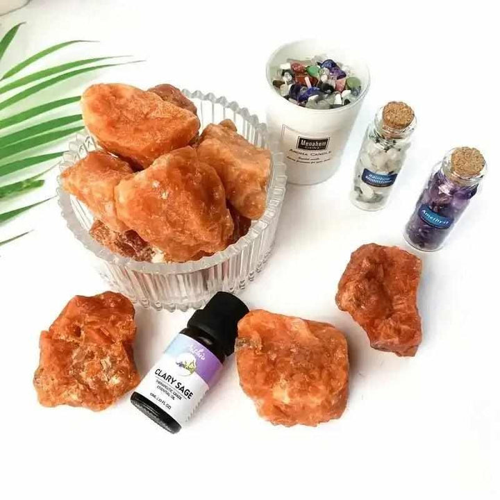 Raw sunstone chunks with warm orange, glittery shimmer for energy, vitality, and solar plexus chakra healing.