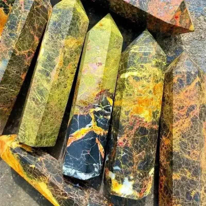 Polished Realgar Crystal Tower with vivid orange-red mineral patterns, a bold display piece for chakra transformation.